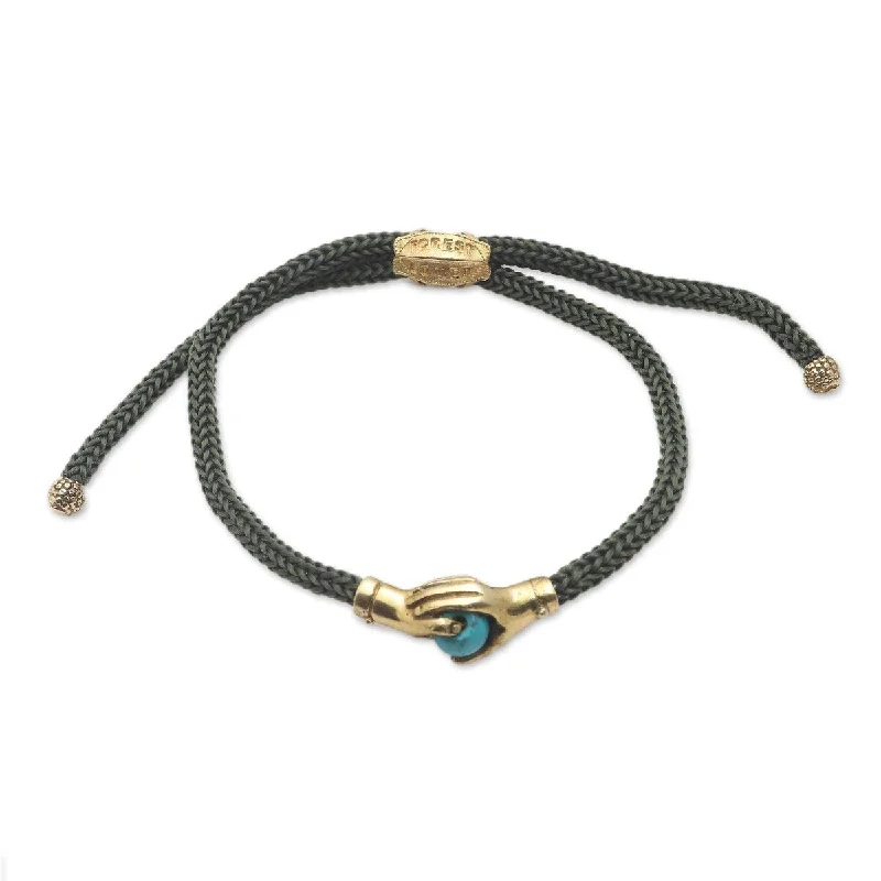 Solid gold bangles-Galaxy Bangles-NOVICA Golden Blue Handshake, Brass and turquoise unity bracelet