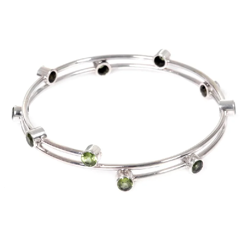 Spinel stone bangles-Rigid Bangles-Peridot Bangle Bracelet, 'Orchid Twist In Green' (Indonesia) - 7'6" x 9'6"